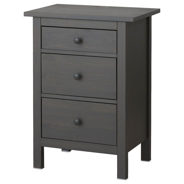 a gray wooden nightstand with three drawers