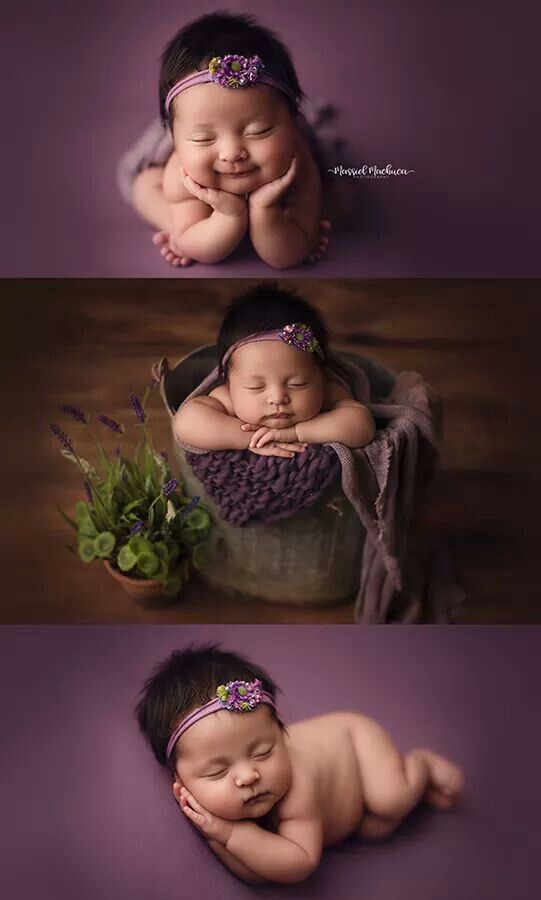 a baby sleeping in a bucket with her hands on her face