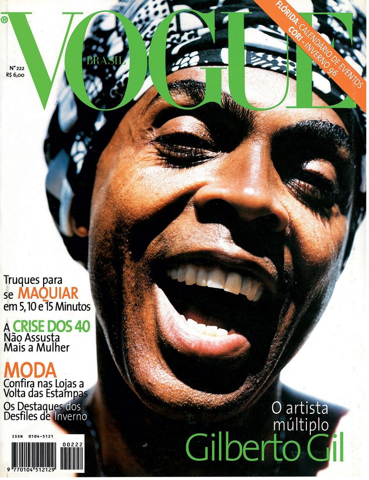 a magazine cover with a smiling man wearing a turban on top of it