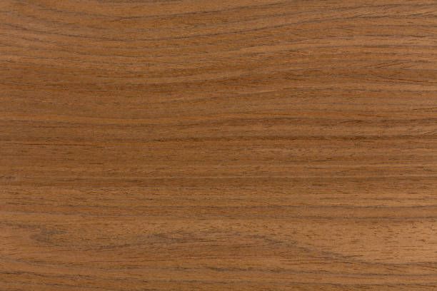 a close up view of the wood grains on this wooden table top that is brown