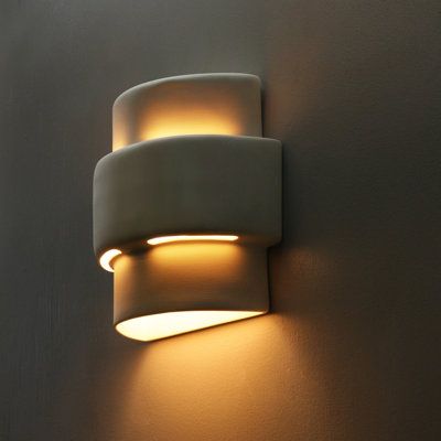 a wall light that is on the side of a wall