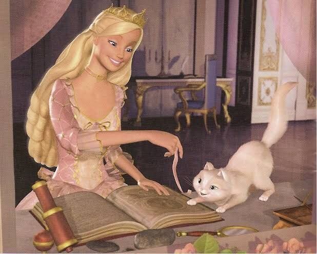 the princess and the cat are playing with each other in front of an open book