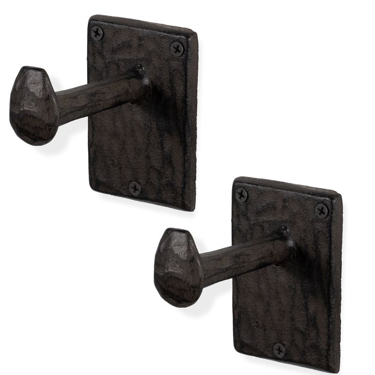 pair of black iron door handles with square knobs on each side, isolated against a white background