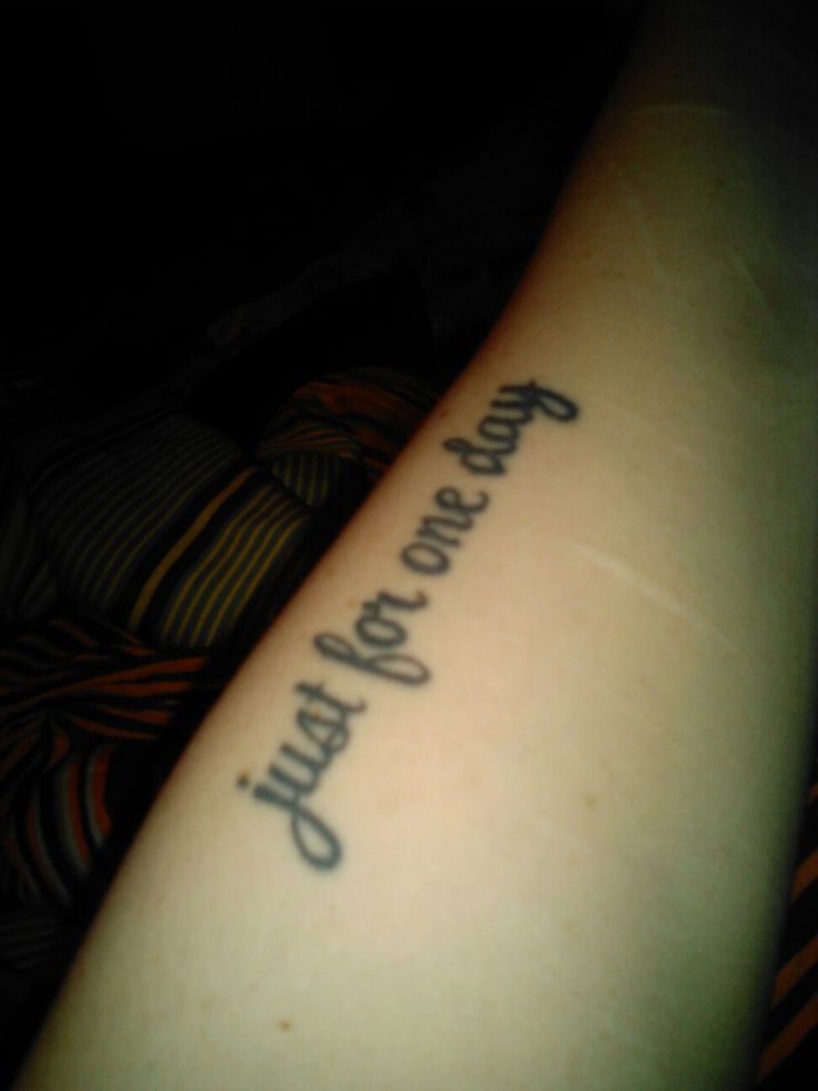 a person with a tattoo on their arm that says, you are not afraid to know