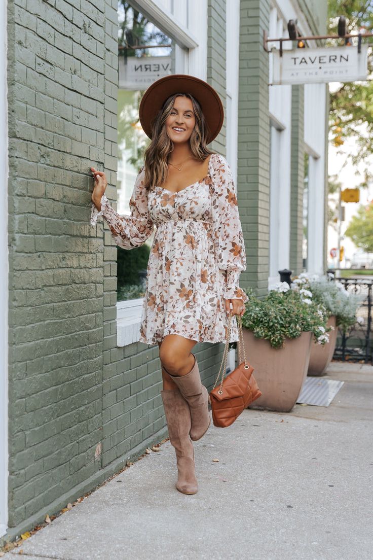 Let this dress be the standout piece in your fall wardrobe! This Cream Floral Mini Dress features a delicate sweetheart neckline, flattering elastic waist, and sheer sleeves, all in a flirty mini length. Perfect for any occasion, this dress offers a chic and feminine look for any fashion-forward individual. Style with knee high boots, a simple clutch, and a wide brim hat for a boho chic look. Sorority Rush Outfits, Cream Floral Dress, Rush Outfits, Gameday Dress, Loungewear Dresses, Fall Dress Outfit, Country Dresses, Casual White Dress, Autumn Dress