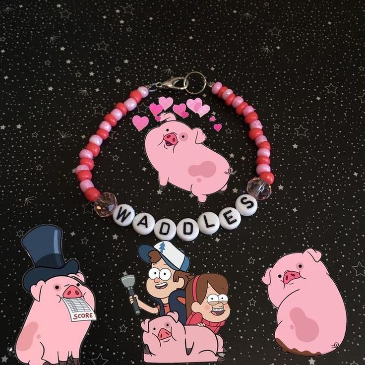 three cartoon characters are hanging on a black background with pink beads and red beaded bracelets