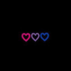 three hearts in the dark with one blue and one pink heart on it's left side