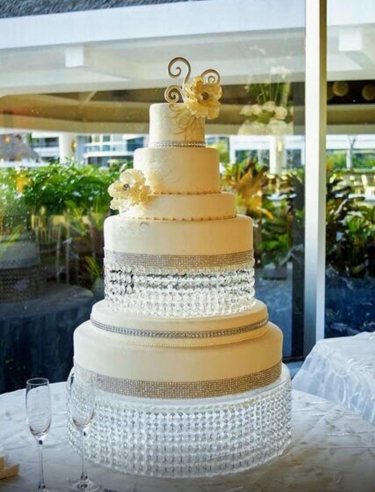 a wedding cake sitting on top of a table