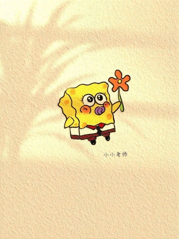 the spongebob is holding a flower in his hand