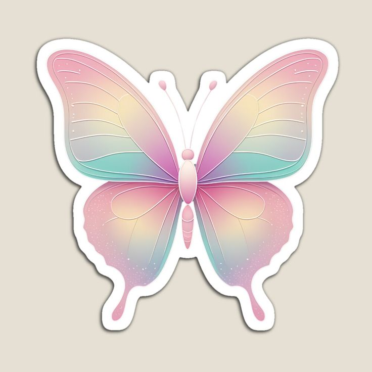 a pink and blue butterfly sticker sitting on top of a white surface with pastel colors