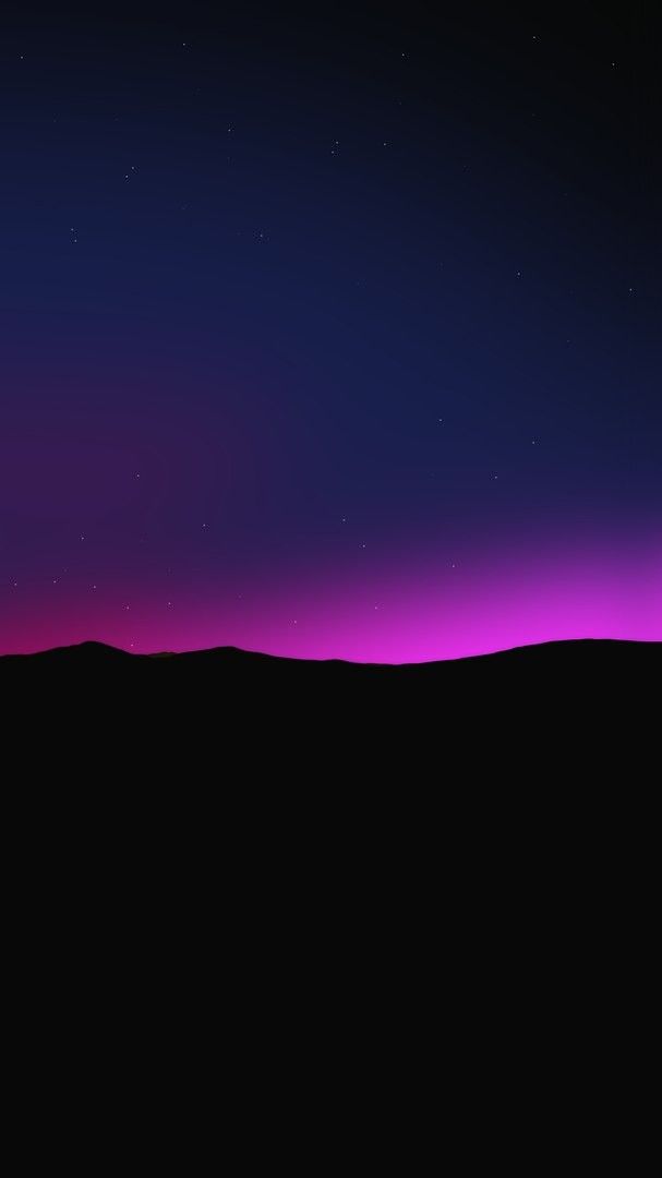 the night sky is lit up with pink and purple lights, as well as stars