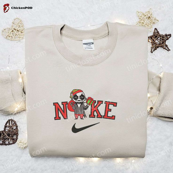 The Nike Christmas x Chibi Jack Santa Embroidered Sweatshirt is the perfect festive attire to elevate your holiday style. Featuring a charming Chibi Jack Santa embroidery, this sweatshirt combines comfort and style effortlessly. Made from high-quality materials, it ensures durability and a cozy feel. The sweatshirt’s relaxed fit allows for easy movement, making it ideal [...] Jorgen Von Strangle, Sweatshirts Ideas, Nike Cartoon, Disney Character Shirts, Nike Hoodies, Nike Stuff, Timmy Turner, Walt Disney Characters, Vanellope Von Schweetz