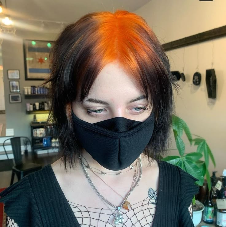 Hair Dye Roots Only, Black Hair Orange Underneath, Fun Vibrant Hair Colors, Grunge Hairdye Ideas, Black Hair Orange Roots, Split Dyed Hair Color Ideas, Ginger Roots Black Hair, Ghost Roots Hair Dye, Black Hair With Colored Roots