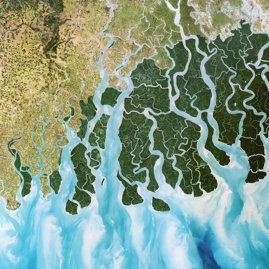 an aerial view of the water and land in this satellite image, it looks like something from space