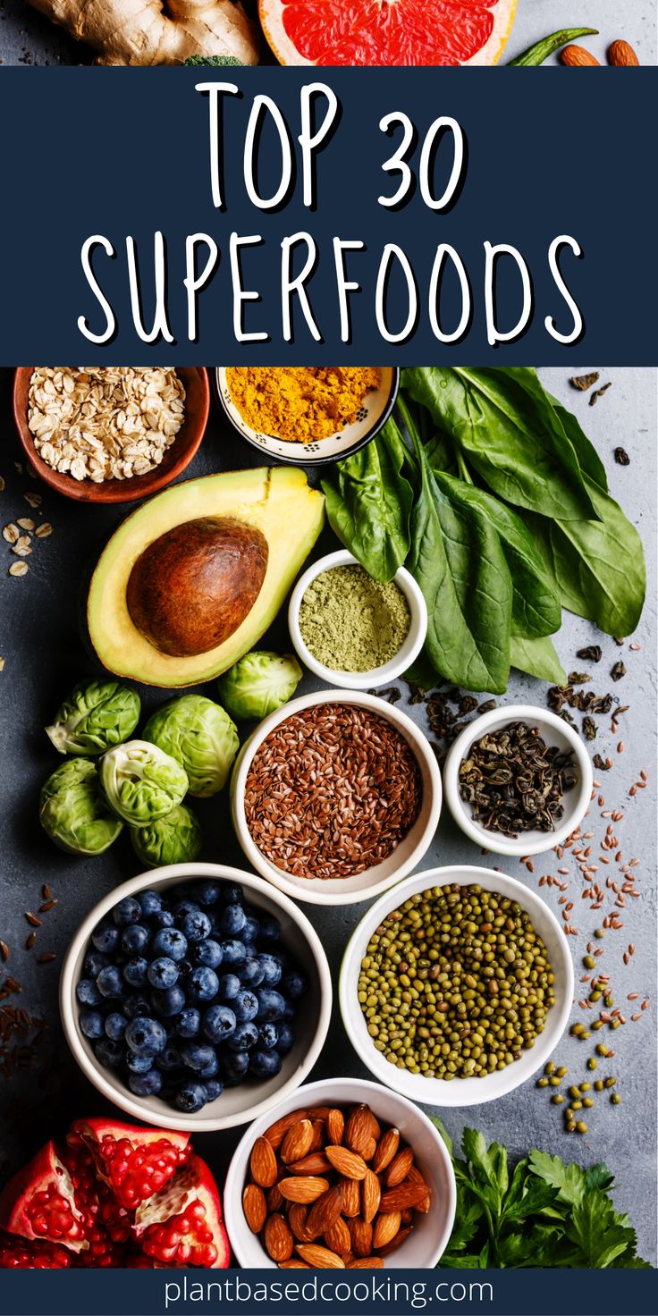 the top 30 superfoods are in bowls and surrounded by other foods