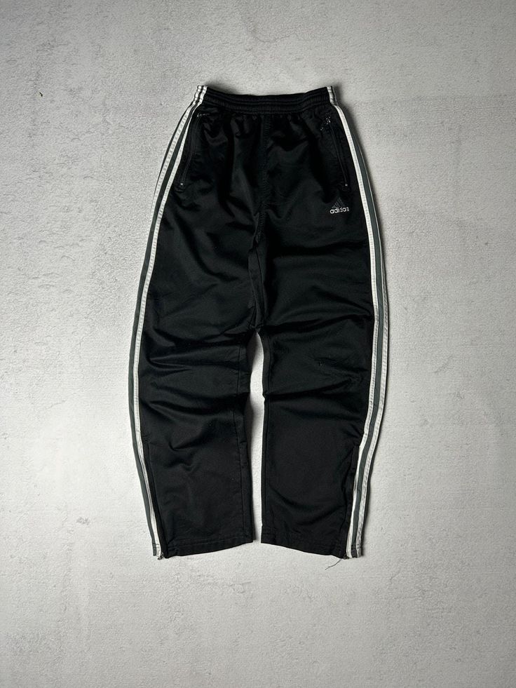 Vintage 90s Adidas Pants, Black Track Pants, Pre-owned Pants, Track Pants - Men's Small, Mens Bottoms Size On Label: Small Recommended Size: Men's Small Measurements: Waist: 28" - 32" Inseam: 30" Streetwear Wide Leg Bottoms With Three Stripes, Wide Leg Pants With Three Stripes For Streetwear, 90s Style Streetwear Trousers, 90s Style Cargo Pants For Streetwear, Retro Black Pants For Streetwear, 90s Streetwear Trousers, 90s Style Black Pants, 90s Style Full-length Black Pants, Black Full-length 90s Style Pants