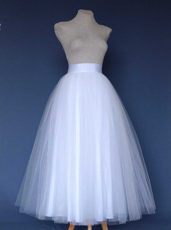 White Tulle Skirt . Wedding tulle skirt .Tea length tulle skirt. Tutu skirt woman. Bridal tutu skirt White Organza Skirt For Wedding, White Organza Wedding Skirt, White Tulle Tutu Dress For Wedding, Wedding Tulle Petticoat, Elegant Wedding Petticoat In Crinoline, White Long Tulle Dress, Elegant Long Tulle Skirt, Elegant White Tulle Tutu Dress, Elegant Tutu Dress With Tulle Skirt For Wedding