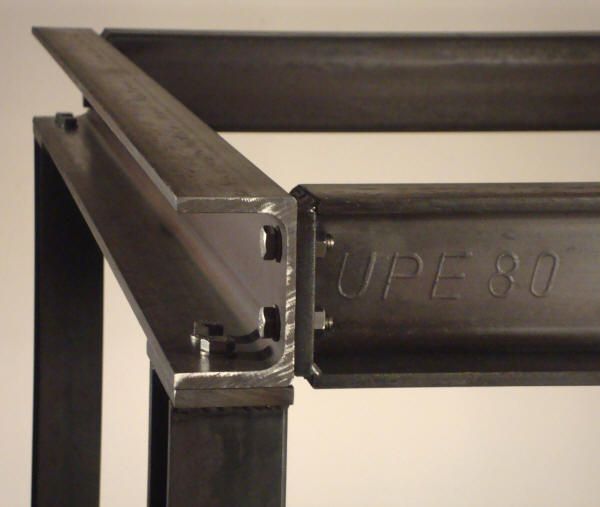 an upe 80 sign mounted to the side of a metal pole with two brackets