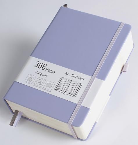 a purple and white book with pages attached to it