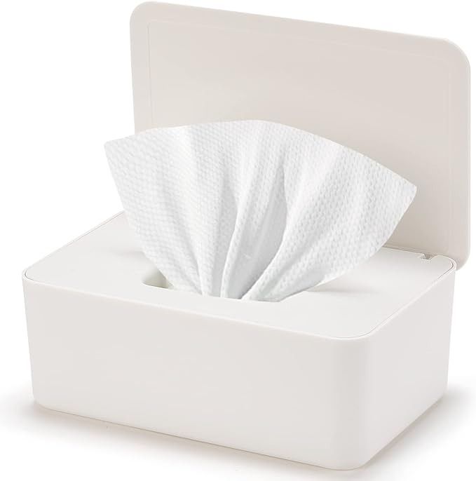 a white tissue box with two tissues in it