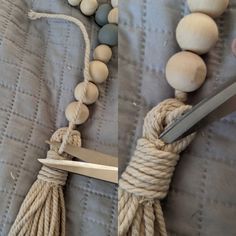 a pair of scissor and beads on a bed with the string tied up