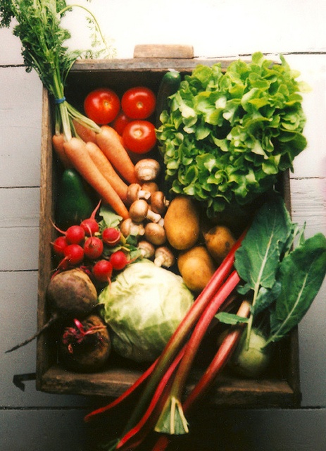 a box filled with lots of different types of fruits and vegetables next to the words eat local eat fresh