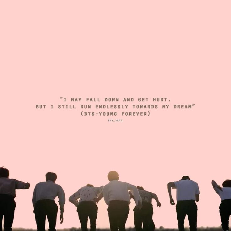 a group of men standing next to each other in front of a pink sky with a quote on it