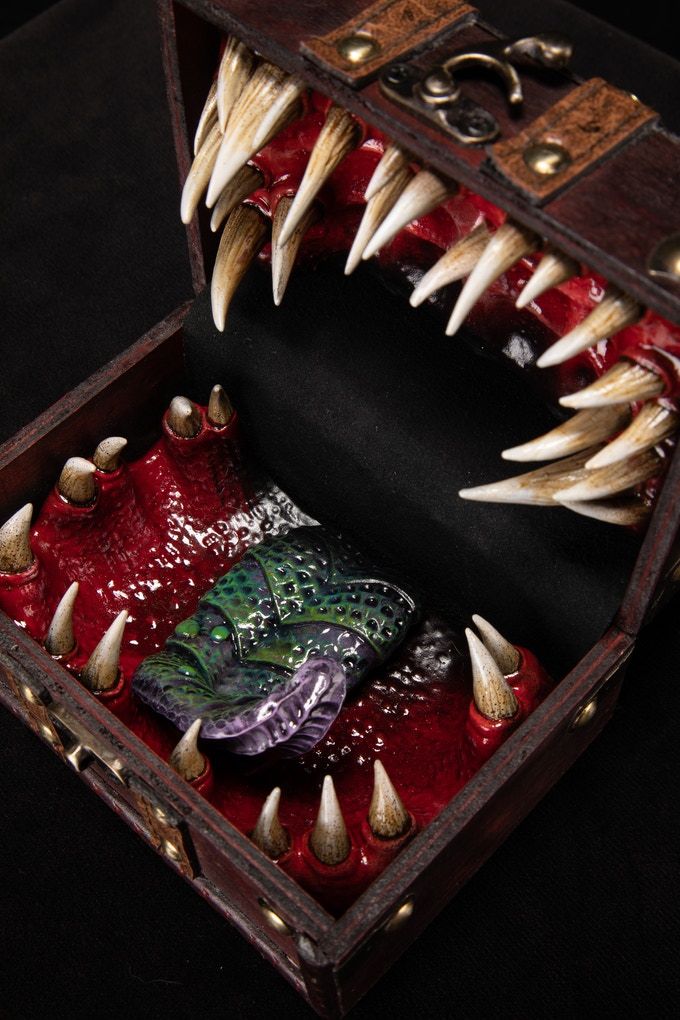 an open box with spikes and blood inside