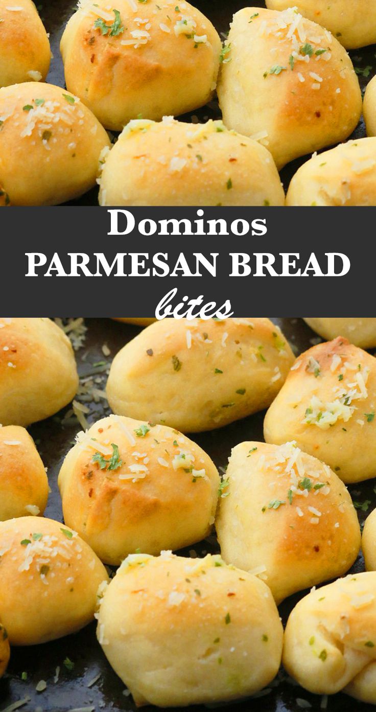 some bread rolls with parmesan sprinkles on them in a pan