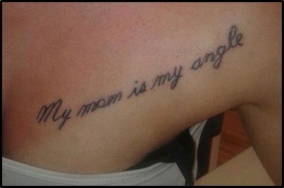 a woman with a tattoo on her back saying, my mom is my angel aww, that's so sweet