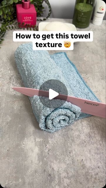 a towel with a knife sticking out of it