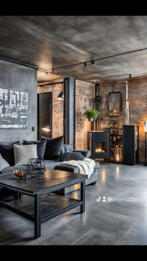 a living room filled with furniture and a fire place next to a brick wall in an industrial style