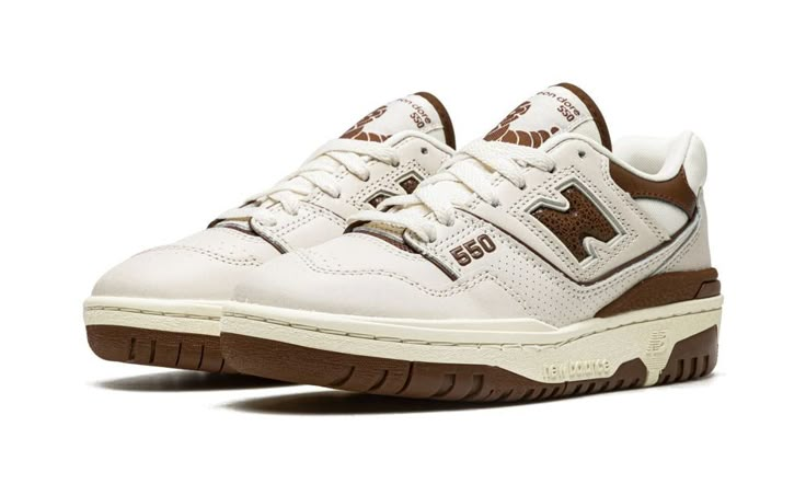 The Aimé Leon Dore x New Balance 550 “Brown” is yet another colorway of the vintage basketball shoe designed by the New York clothing brand and New Balance.  The 550 model was brought back by Aimé Leon Dore in 2020 when Teddy Santis, “ALD’s” founder and lead designer, found the shoe while combing through New Balance’s archives for design inspiration.  The 550’s throwback design is timeless in every way possible.  Here, the “Brown” colorway features a cream perforated leather construction.  A con 550 Aime Leon Dore, Basket New Balance, New Balance Brown, 70s Converse, Adidas Campus 80s, Nike X Travis Scott, Ugg Ultra Mini, Converse Run Star Hike, Leon Dore