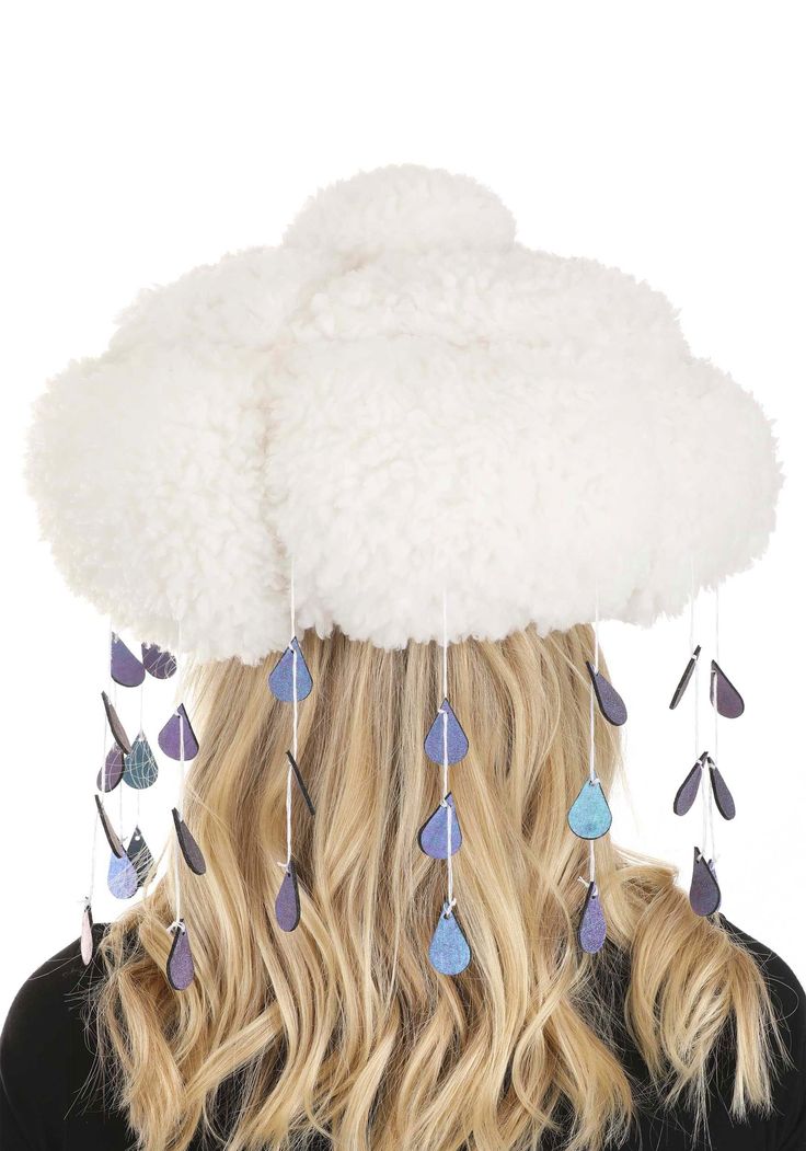 Silver Lining How unusual! A small cloud appears to have floated down from the upper atmosphere and made itself at home on your head. This means that you always have your own personal rainstorm gusting around your ears, but on the plus side, it makes you look extra fabulous fabulous.  Product Details Have the best accessory under the sun (so to speak) when you wear your exclusive Adult Sherpa Light-Up Rain Cloud Costume Hat! The polyester sherpa hat is stuffed with fiberfill to make it look like Rain Headpiece, Rain Cloud Costume, Cloud Hat, Sherpa Hat, Cloud Fashion, Sea Creature Costume, Cloud Costume, Fairy Hat, Unusual Hats