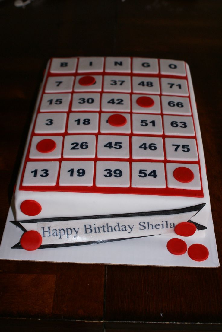 a birthday cake that is shaped to look like a sudato board with numbers on it