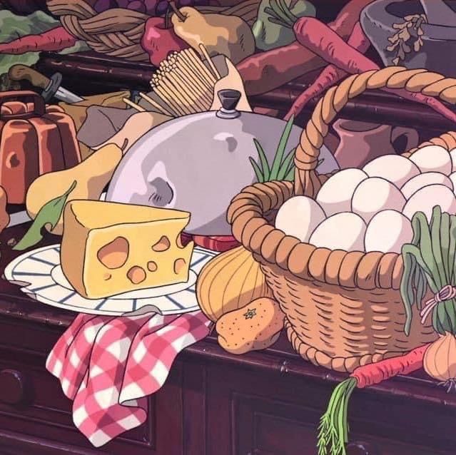 a basket full of food sitting on top of a counter next to eggs and cheese