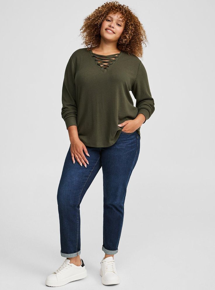 FIT Model is 5'10. 5” wearing size 1. . Measures 31” from shoulder (size 2). MATERIALS + CARE Waffle knit fabric. 64% polyester, 33% rayon, 3% spandex. Machine wash cold. Tumble dry low. Imported. DETAILS V-shaped neckline. Long sleeves. The best plus size women's waffle lace up v-neck long sleeve top lace-up tops in deep depths made of waffle. Torrid is your destination for cozy fall and winter clothes to keep you warm and comfortable. New Street Style, Active Outfits, Sweaters Online, Softest Sweater, Waffle Knit, Sweater Shop, Long Sleeve Sweatshirts, V Shape, Fitness Models