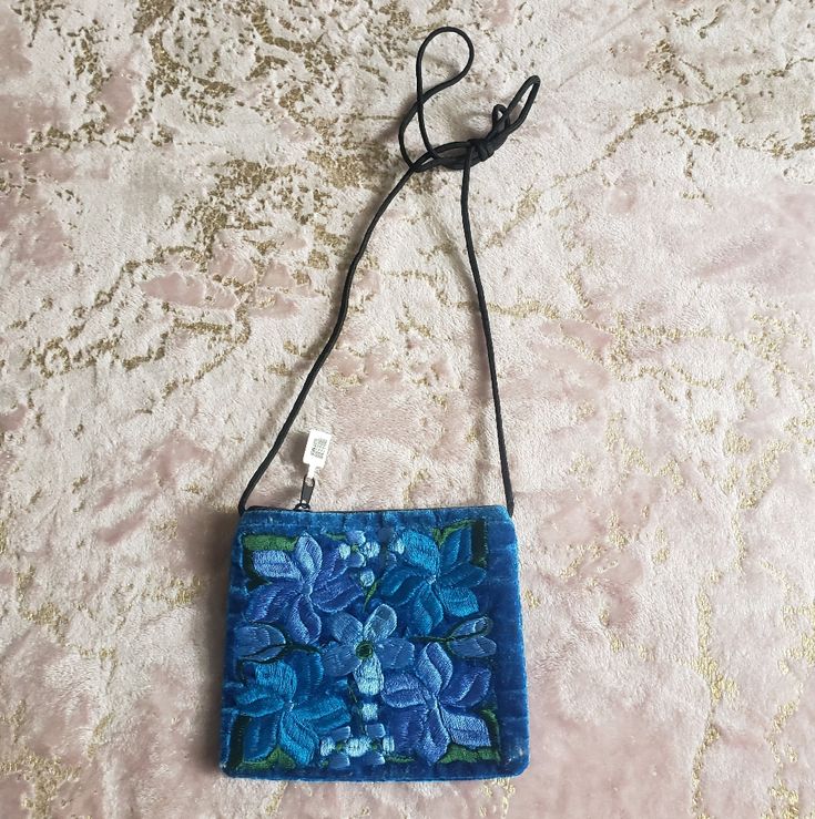 Nwot * Brand New Without Tags Size: See Pics Brand: Handmade Color: Blue Floral Bag | Small Floral Bag Condition: Pre-Owned But Never Used. Was A Gift I Received But I Never Used And Have Been In Storage. No Visible Rips/Scuff Or Holes. * No Trades * Bundle And Save * Message Me With Any Questions * Please Review Pics/Video Carefully Smoke Free Dog Friendly Home Small Handmade Bag For Daily Use, Blue Bag With Zipper Pouch For Daily Use, Small Handmade Bags For Daily Use, Blue Rectangular Pouch For Daily Use, Blue Square Shoulder Bag With Mobile Phone Pocket, Rectangular Blue Pouch For Daily Use, Blue Crossbody Pouch, Blue Shoulder Bag Pouch For Everyday Use, Blue Crossbody Bag As Gift