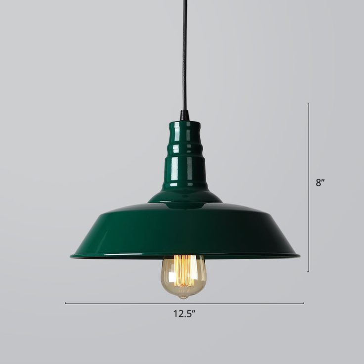 a green light hanging from the ceiling with measurements for it's bulb and height