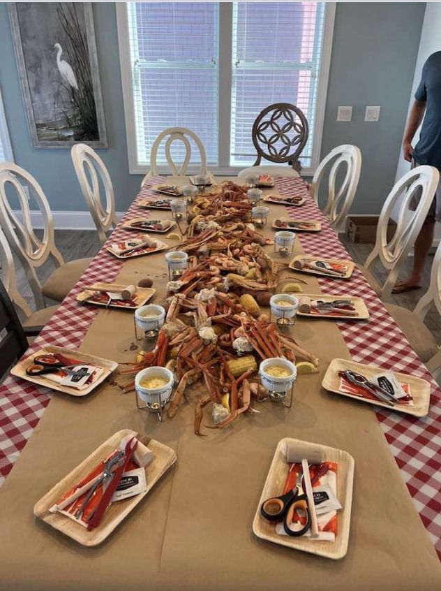 a long table is set with food and utensils