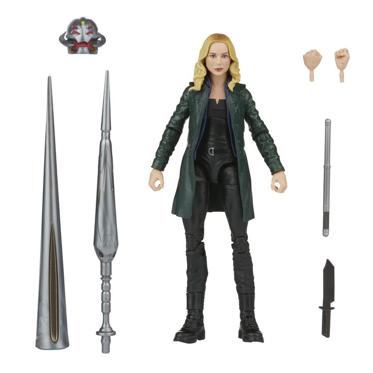 the action figure is shown with accessories for her and other things to be seen in this image