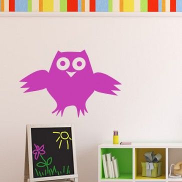 an owl wall sticker in a child's room