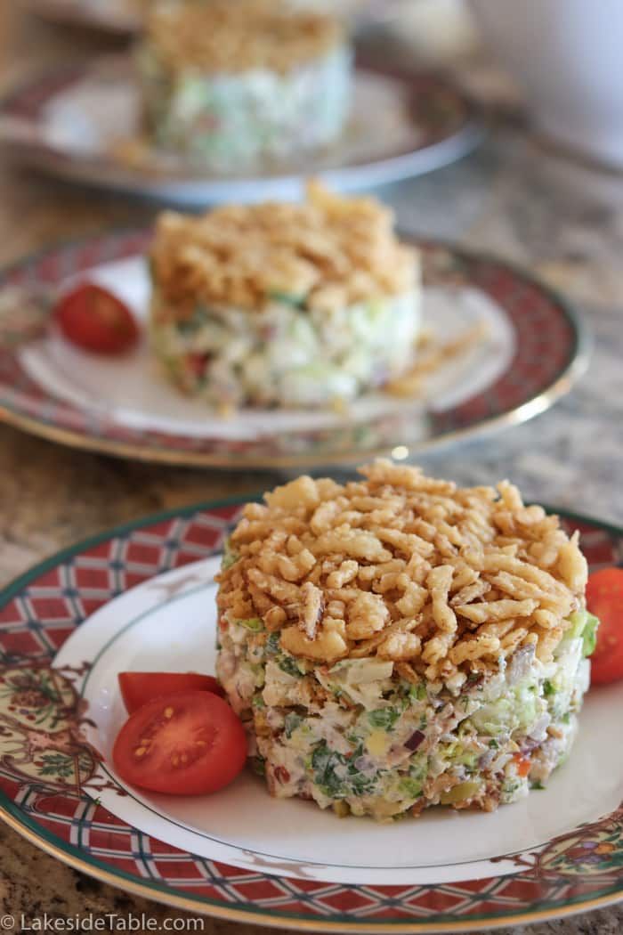 two plates with food on them sitting on a table