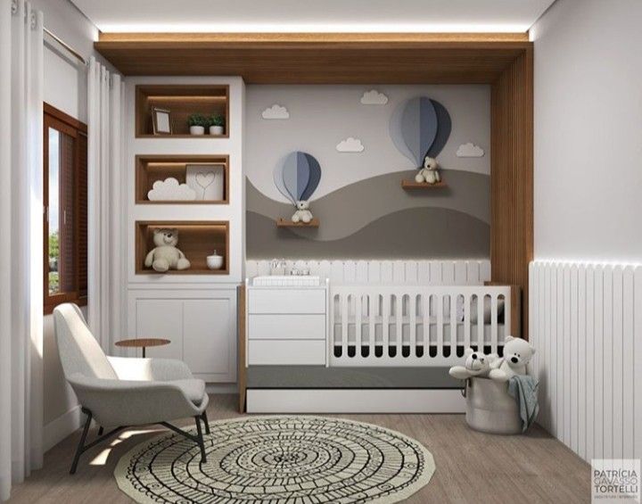 a baby's room is decorated in white and wood