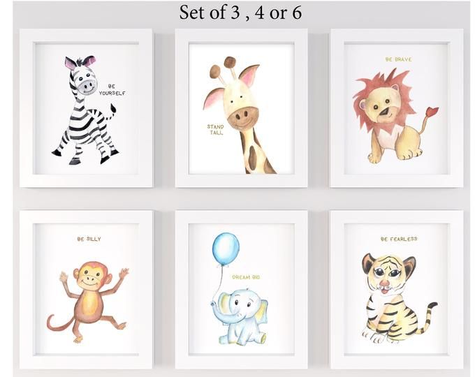 four framed pictures with animals on them in different colors and sizes, each featuring an elephant, zebra, giraffe, lion, monkey