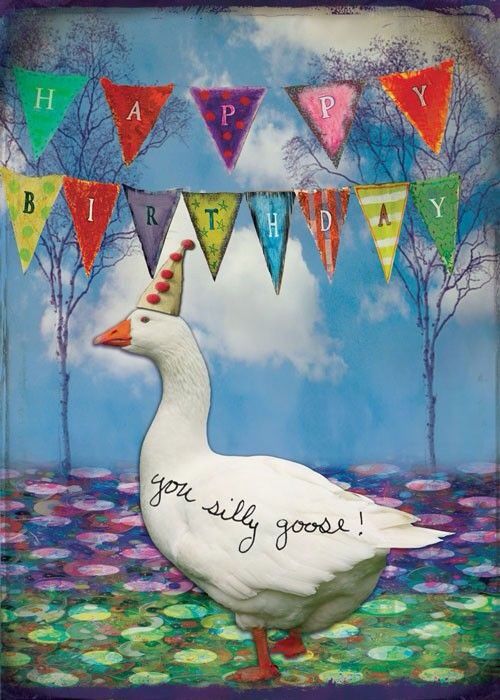 a white duck with a birthday hat on it's head