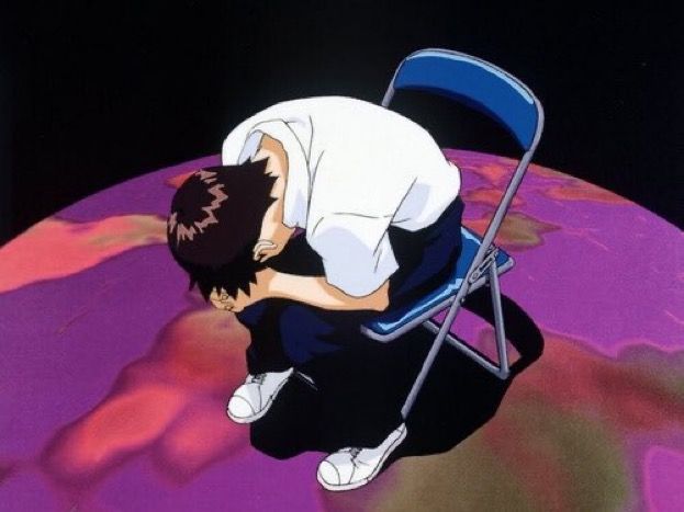 a man kneeling down next to a chair on top of a purple and red planet