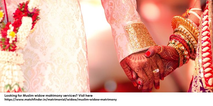 the bride and groom are holding hands