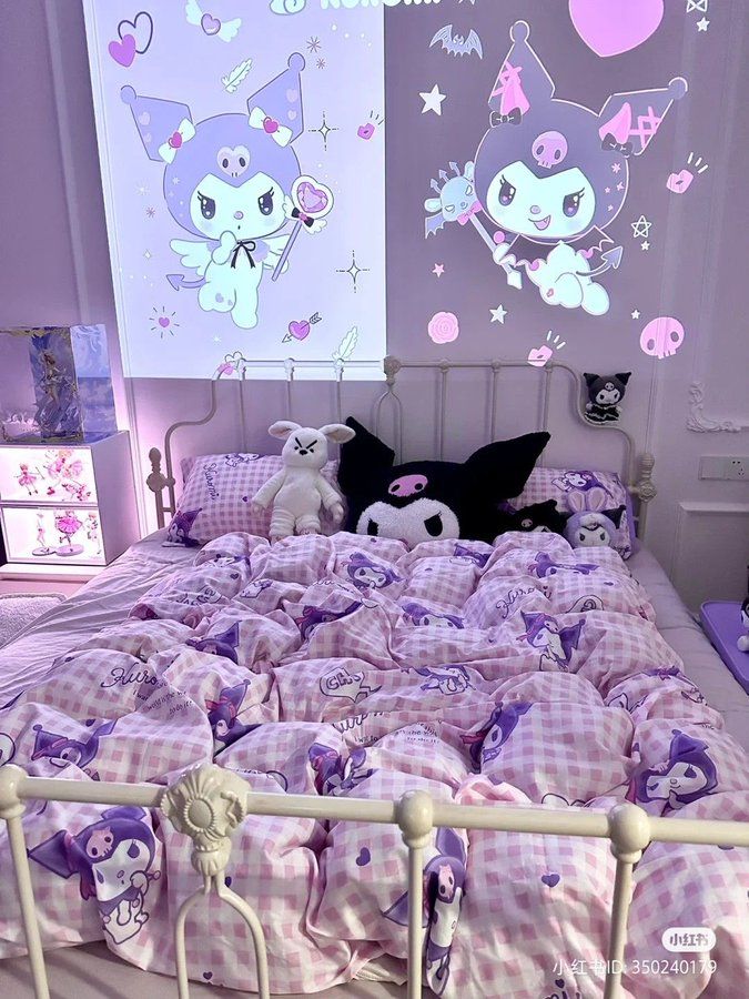 there is a bed with pink and purple bedspread on the bottom half, and two stuffed animals on the top half