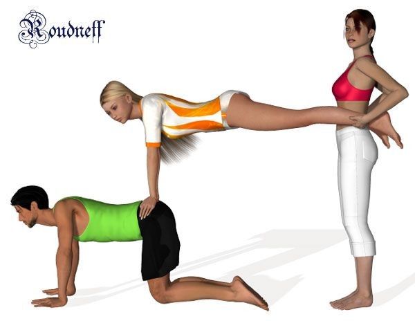 two people are doing yoga poses on their stomachs and knees, one is bending over the other's head